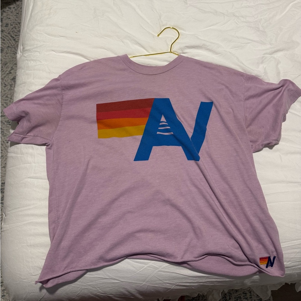 Purple T-Shirt with Colorful Graphic